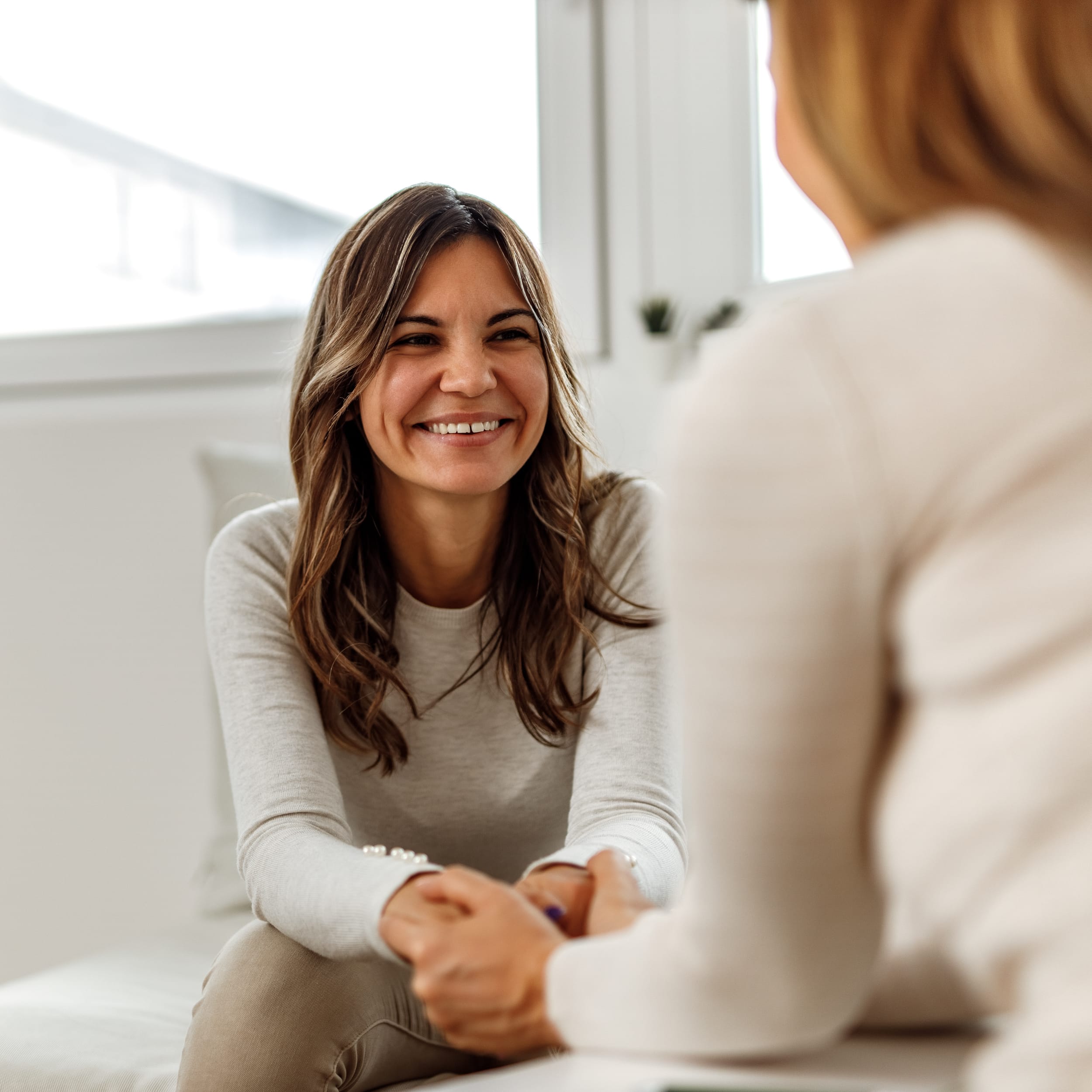 smiling woman in therapy session
